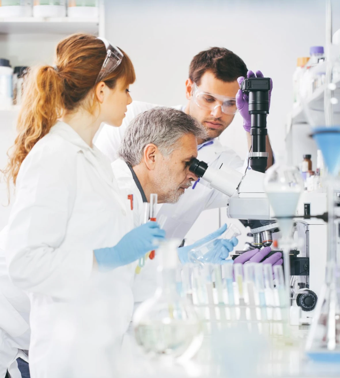 scientists conducting research in the laboratory